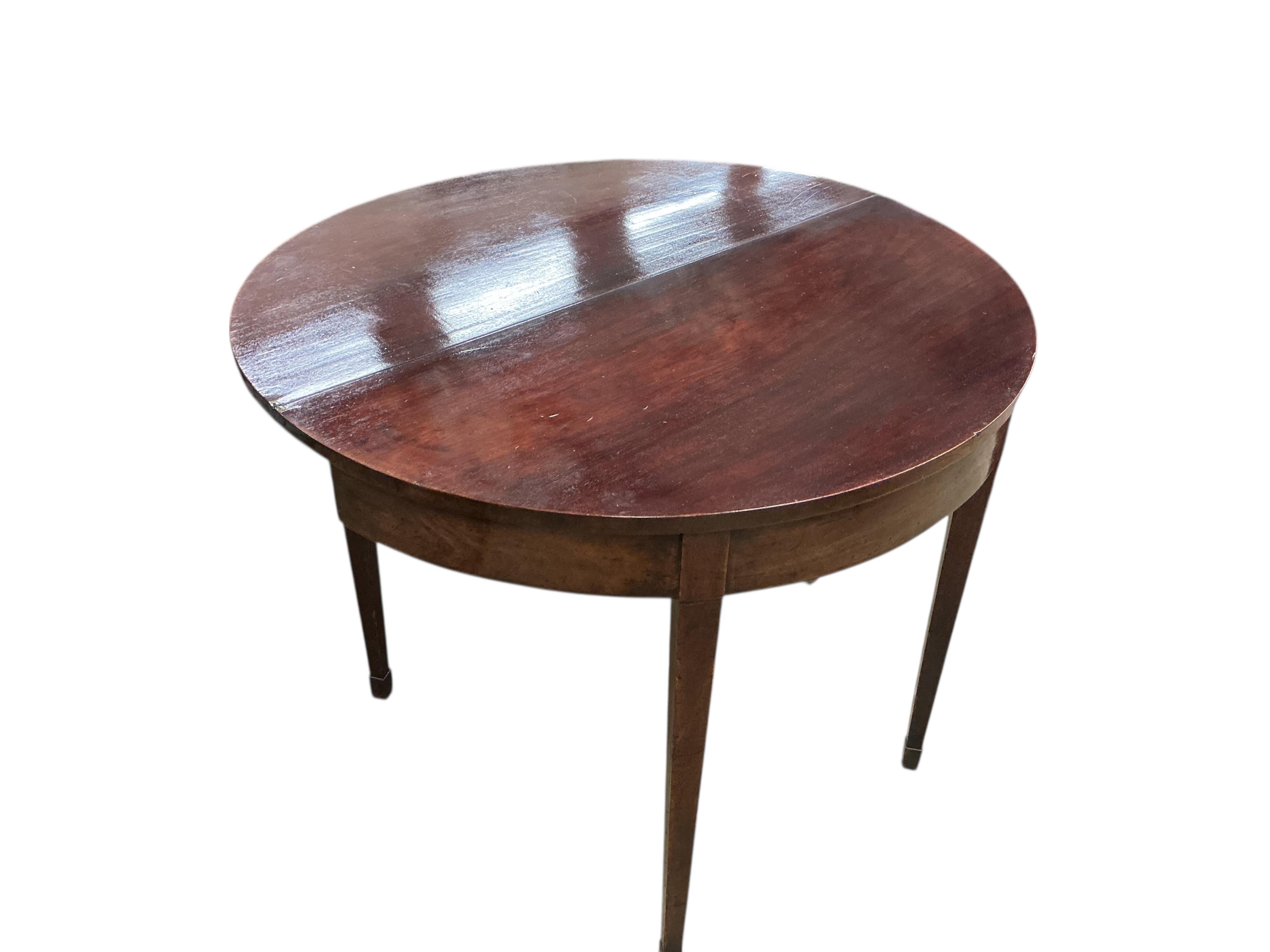 A George III mahogany 'D' shaped folding tea table, width 90cm, depth 45cm, height 73cm